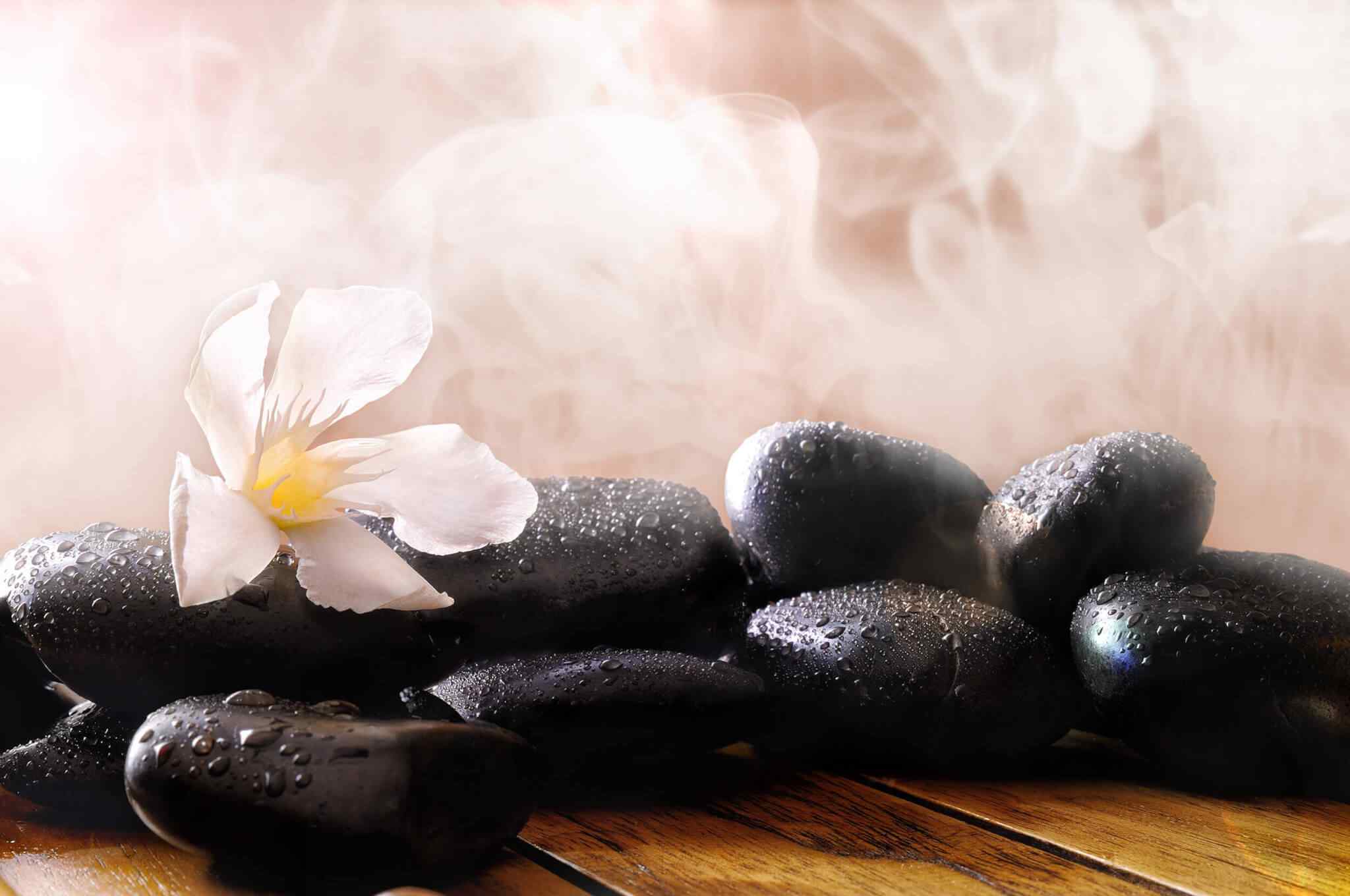 https://hautelasalon.com/wp-content/uploads/2018/11/spa-stone-massage-4.jpg